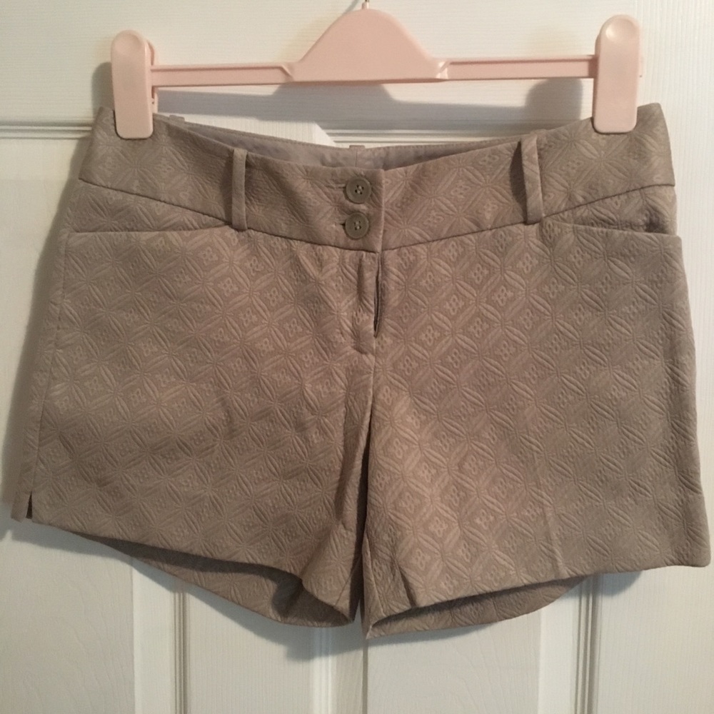 Textured dress shorts with front and back pockets.